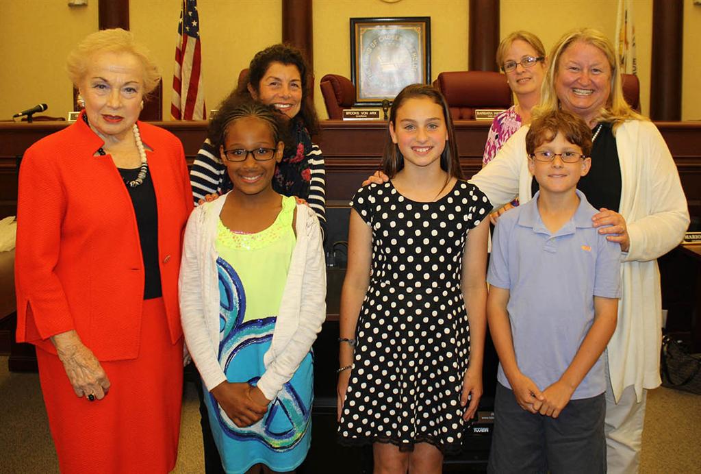 Freeholder Lillian G. Burry congratulates all of the Monmouth County Historical Commission essay contest winners and their teachers on June 1 in Freehold, NJ. Front row left to right: Freeholder Lillian G. Burry, Vivianna Wilson, Amelia Rizzi and Jeffrey Vitale. Back row left to right: teachers Elynn Shapiro of Midtown Elementary School in Neptune, Alexis Kleinman and Nancy Lukas of St. Catharine School in Spring Lake.